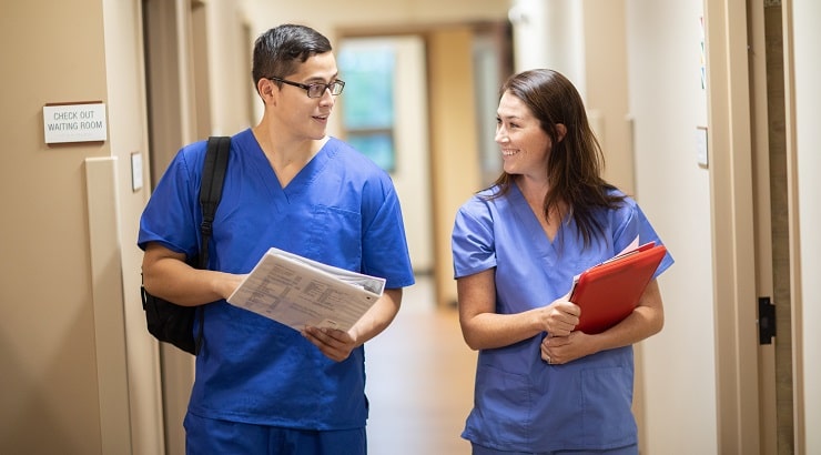 students wearing medical scrubs