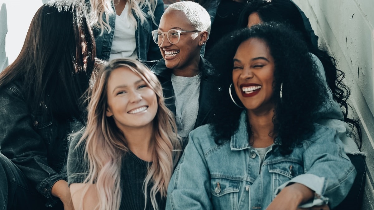 group of women talking and laughing