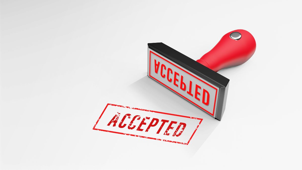 red accepted stamp on white background