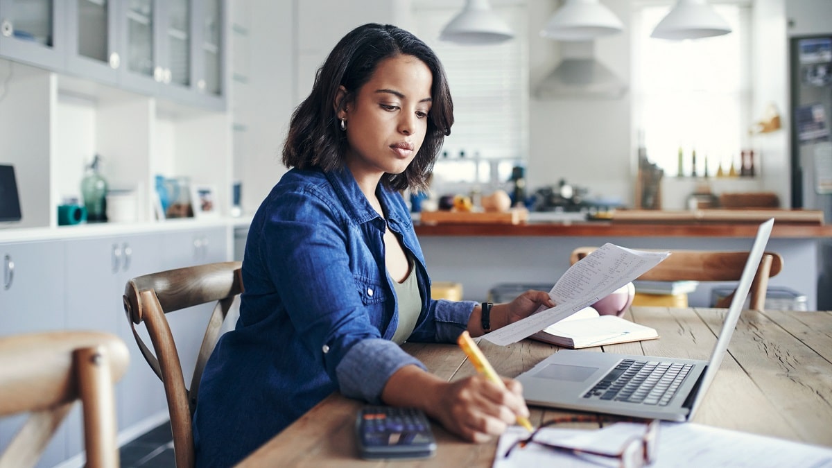 woman paying student loan bills